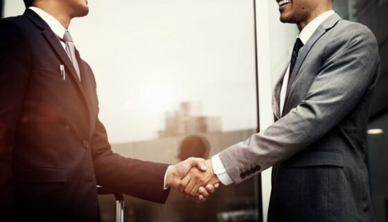 corporate-businessmen-shaking-hands